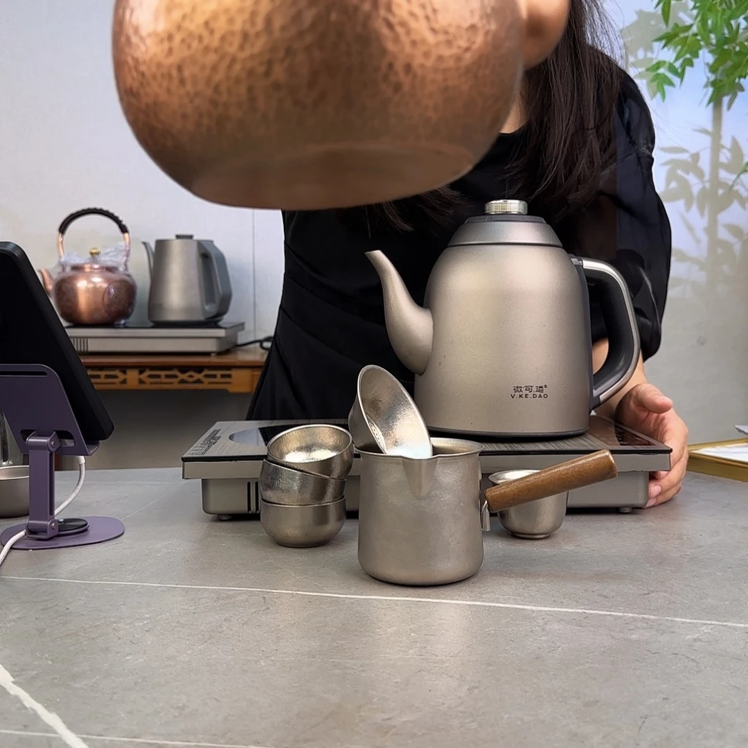 徐***刚纯钛微可道纯钛烧水壶+铜壶