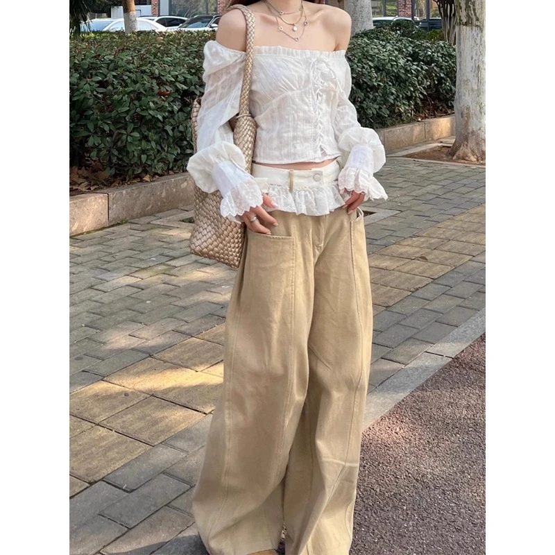 美式辣妹卡其色蕾丝腰头拼接弯刀牛仔裤今年流行的爆款裤子拖地裤