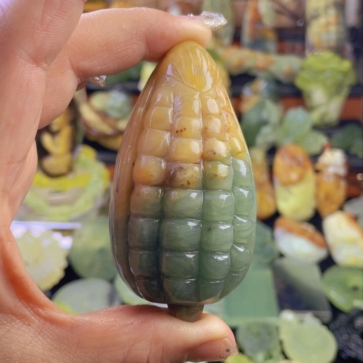 蛇纹石玉手把件合金