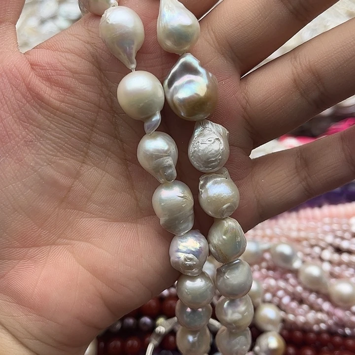 猫****玛瑙/玉髓未镶嵌珠宝半成品一条巴洛克珍珠有生长孔