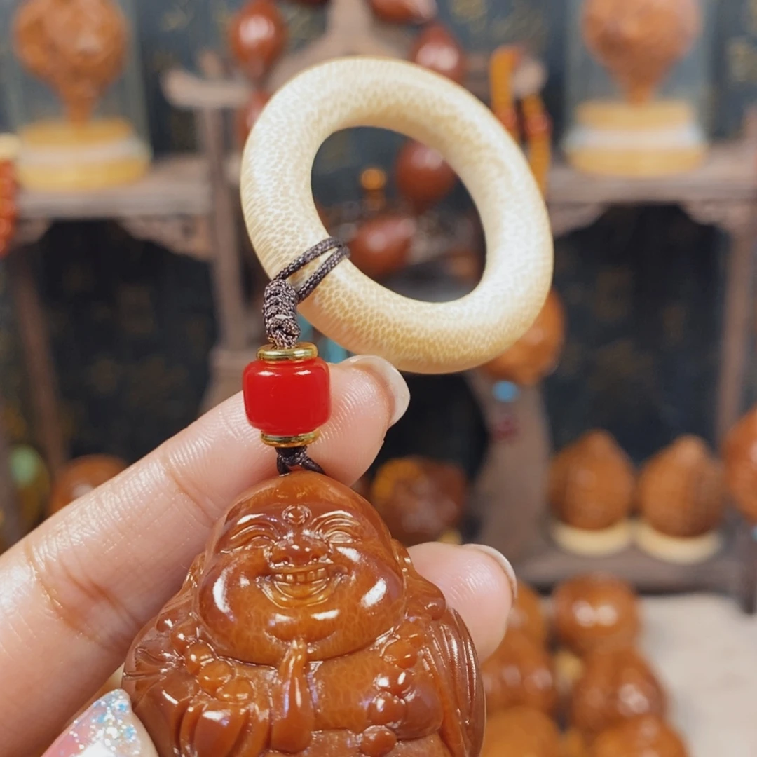 橄榄核吊坠弥勒单颗000