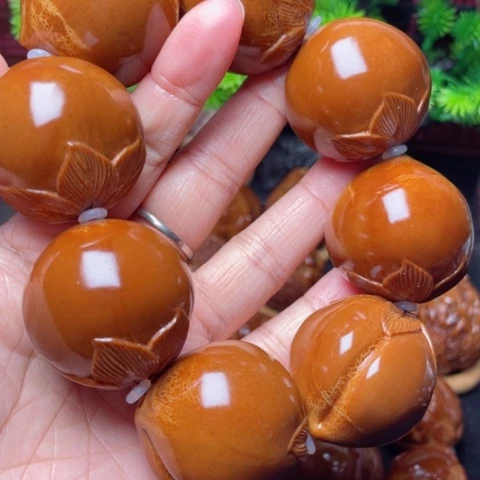 【闪购商品】手串/手链橄榄核开****。35左右寿桃手持
