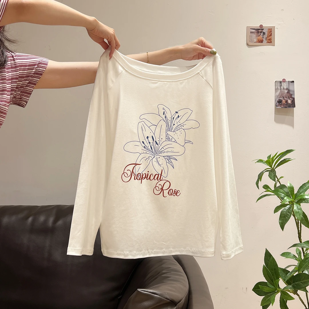 辣妹斜肩百合印花长袖T恤女秋季新款宽松慵懒感性感露肩上衣
