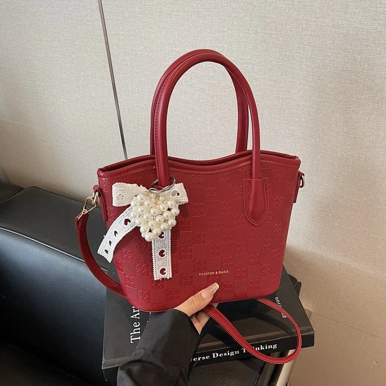 红色包包女2025新款手提菜篮子包高级感轻奢新娘结婚包单肩斜挎包