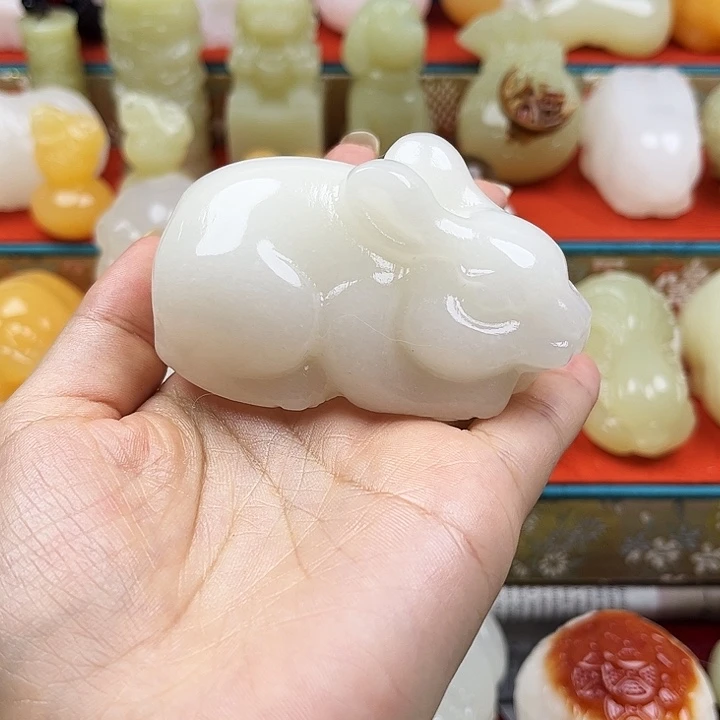 江***海石材兔子手把摆件