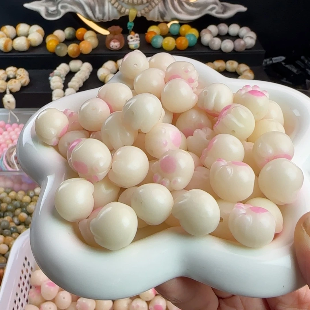 菩提根/象牙果吊坠瑕疵卡16粉色猫爪100颗不挑瑕疵批发