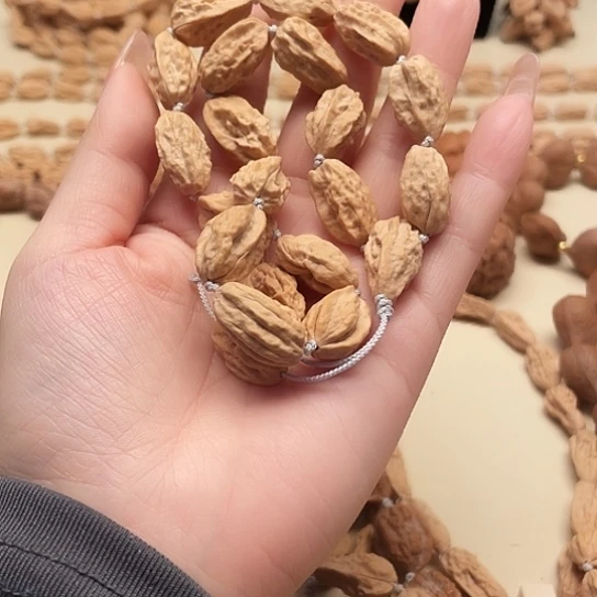 ઇ***࿐文玩核桃吊坠异形手持