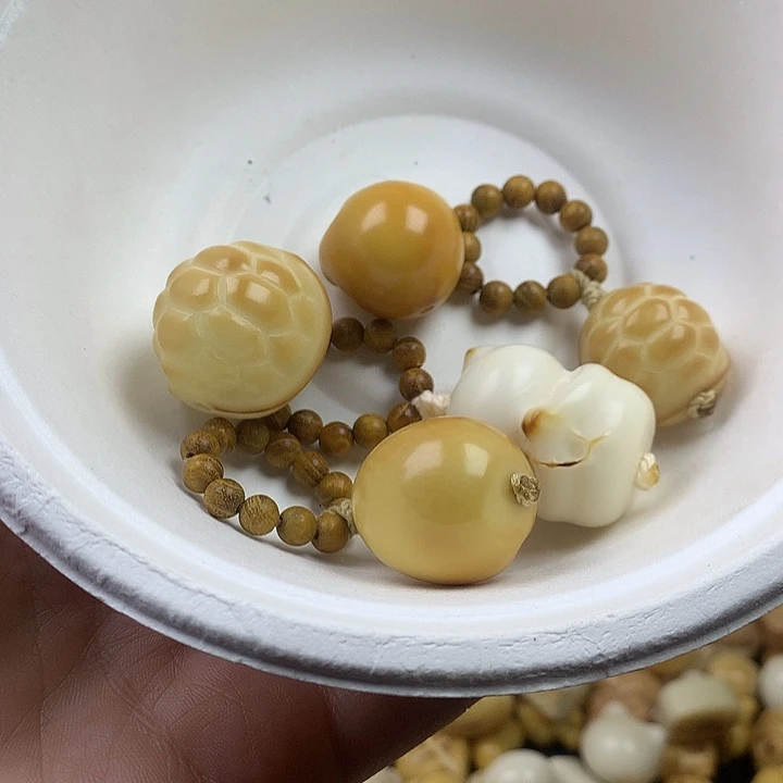 哈***儿吊坠菩提根/象牙果象牙果5个小提溜瑕疵 不退不换