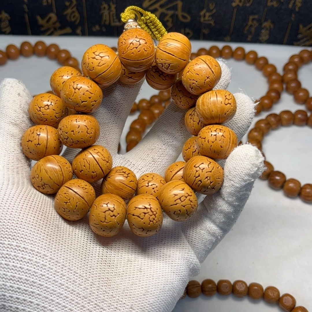 浩***一脑纹桃核手持，尺寸18.加