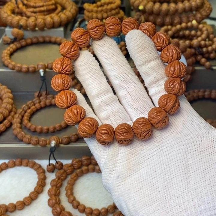 喜***子桃核手串秦岭龙纹