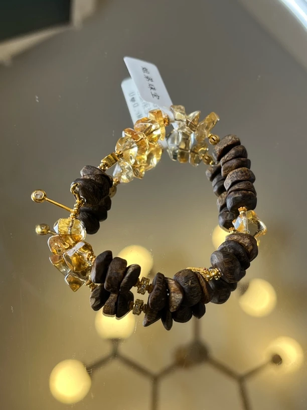 沉香留疤料沉香黄水晶手串C6810