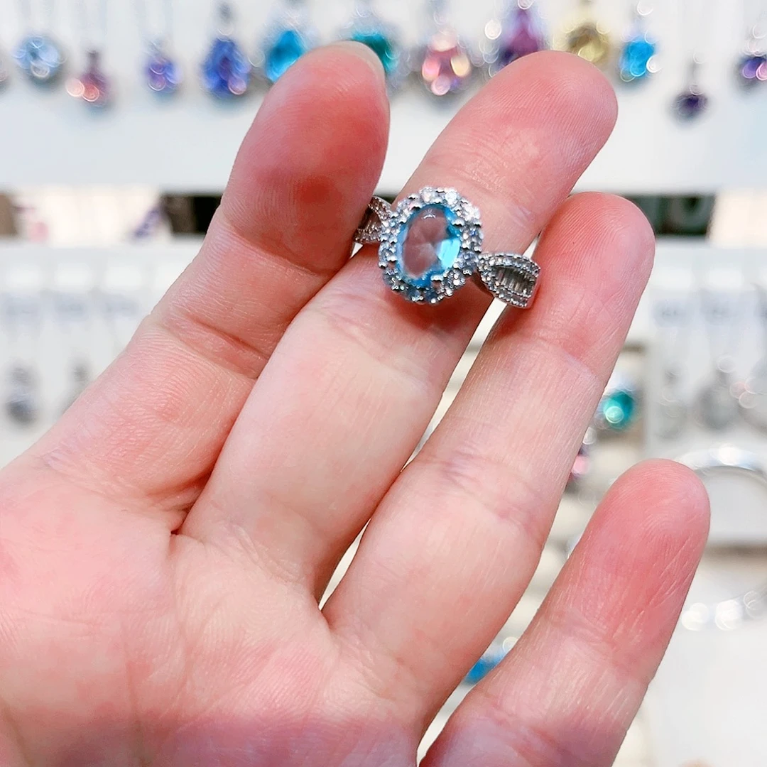 浪***子足银镶嵌托帕石戒指