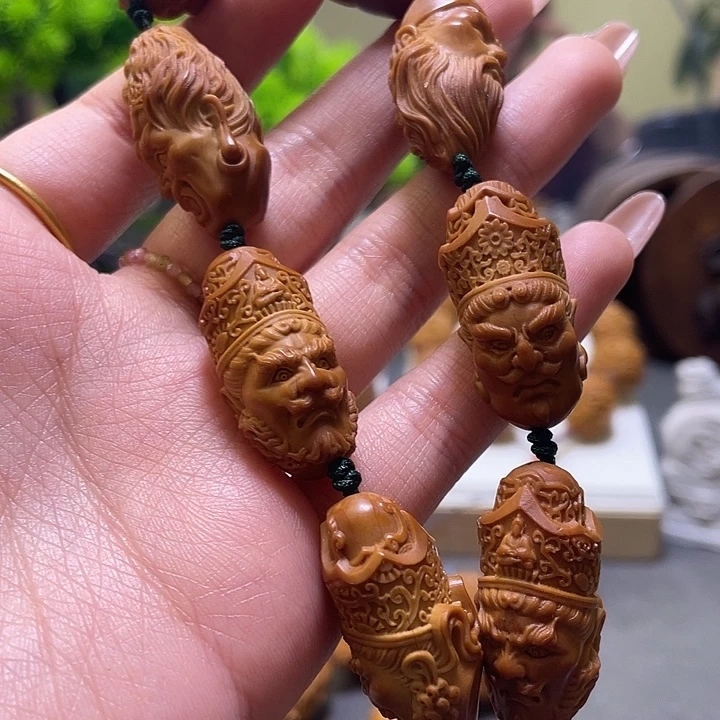 孟***魂橄榄核吊坠橄榄核雕