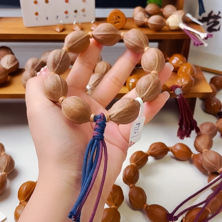 是****ღ19x27梅林铁核手串9颗