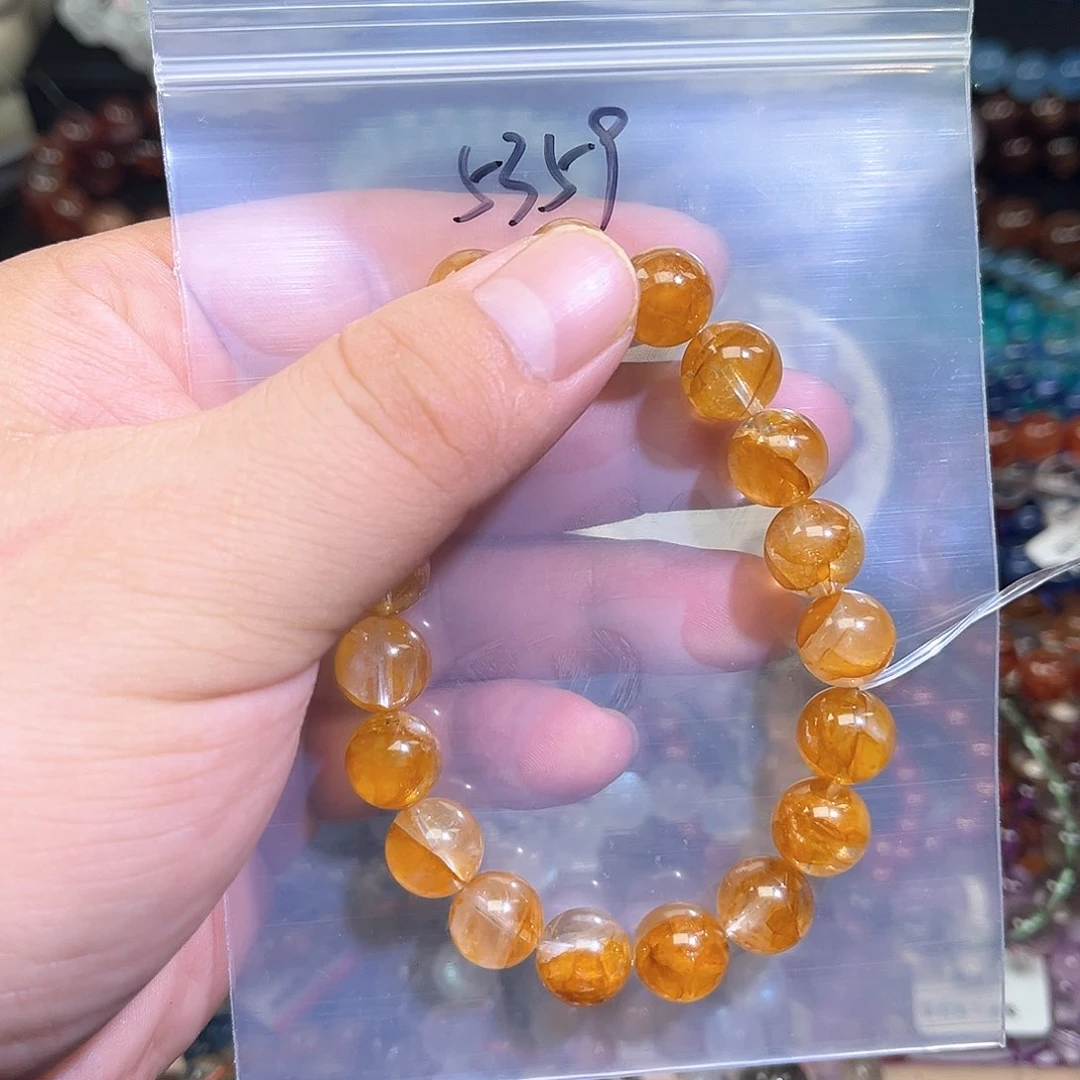 水晶手串未镶嵌?****?天然水晶黄胶花10加