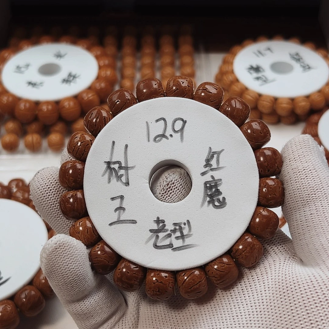 桃核手串小***疒桃核手串