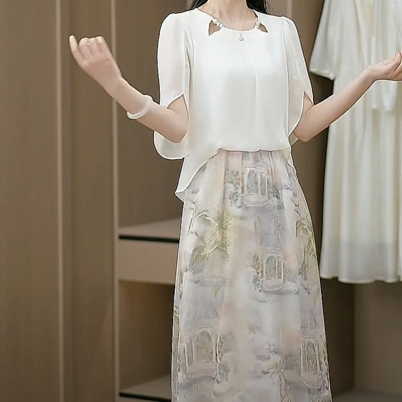 2025夏季新款优雅时尚气质清新修身显瘦拼接碎花休闲假两件连衣裙