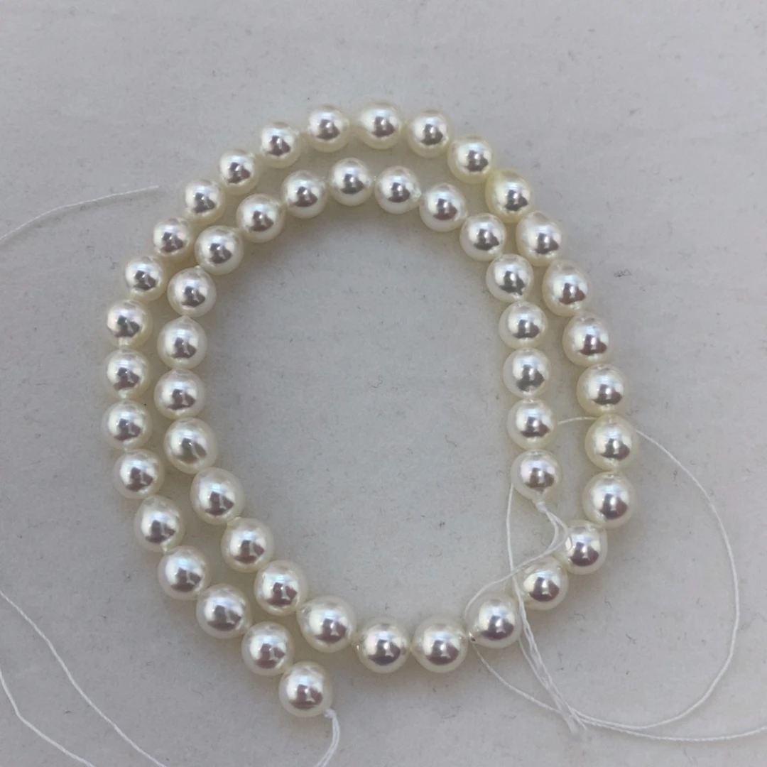 未镶嵌裸珠海水珍珠AK满串7.5～8