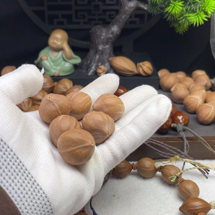 用***5橄榄核手串/手链2.1*2.5原皮四花铁核12颗