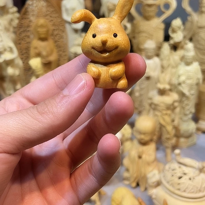 黄杨木兔子手把件