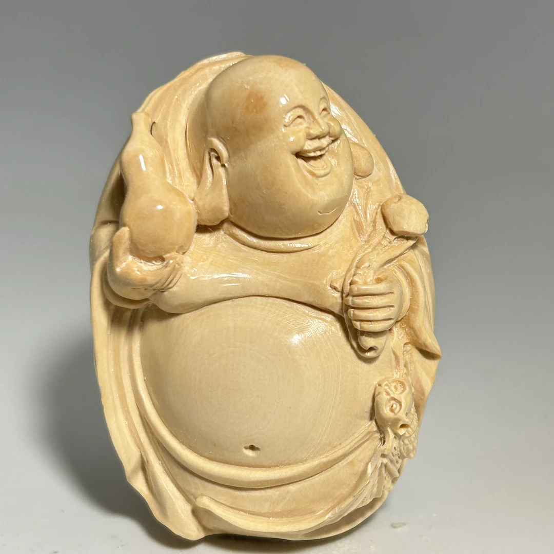 猛犸牙雕奶黄弥勒把件53*38*23mm假一罚四X1141