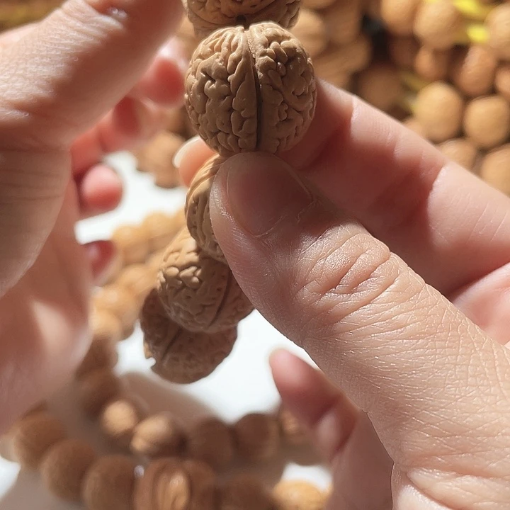 桃核吊坠桃核手串野生。13