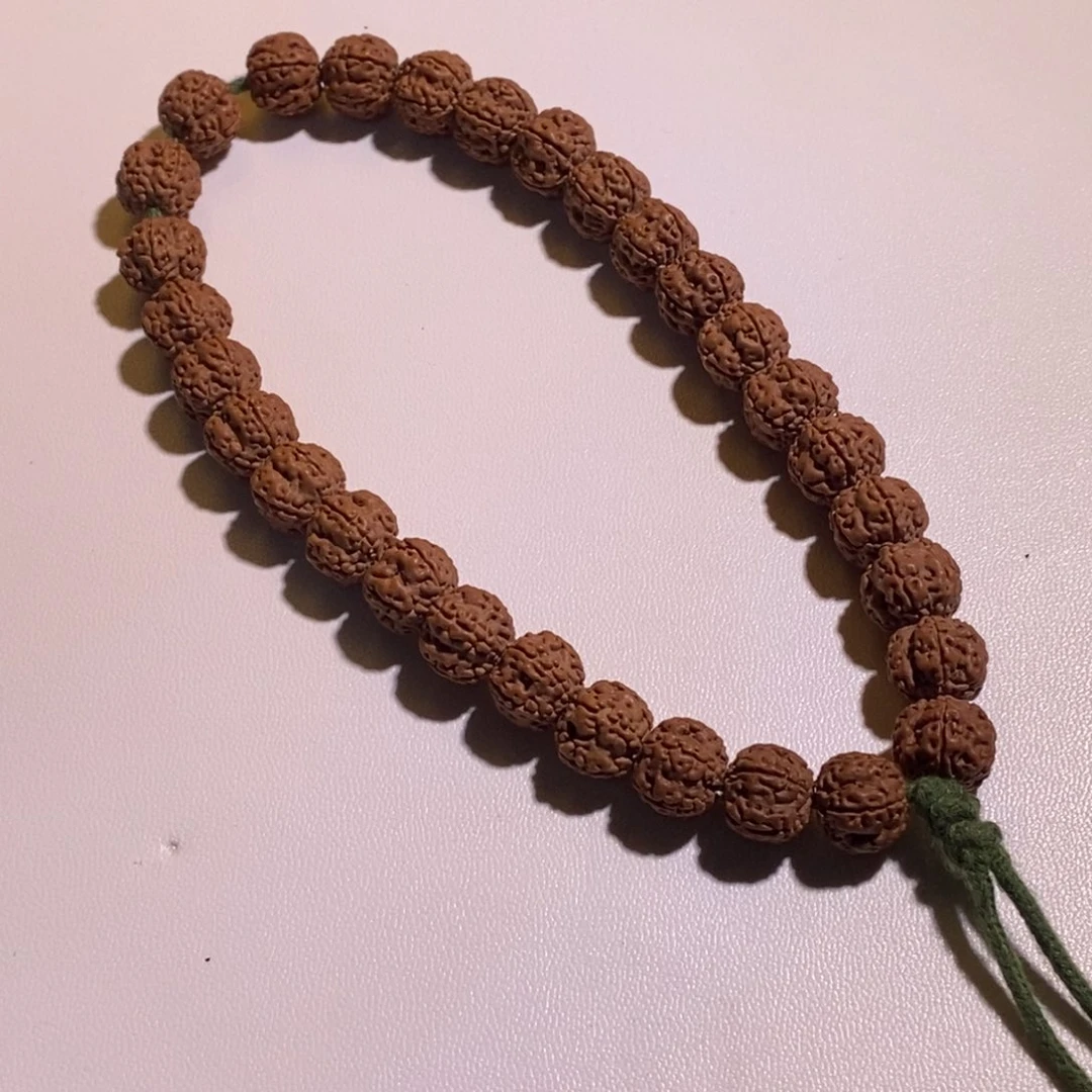 ε***.金刚菩提吊坠梅花手持