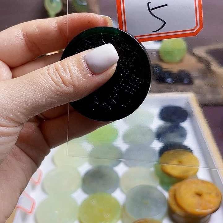 靖***他蛇纹石玉合金珠宝奇石