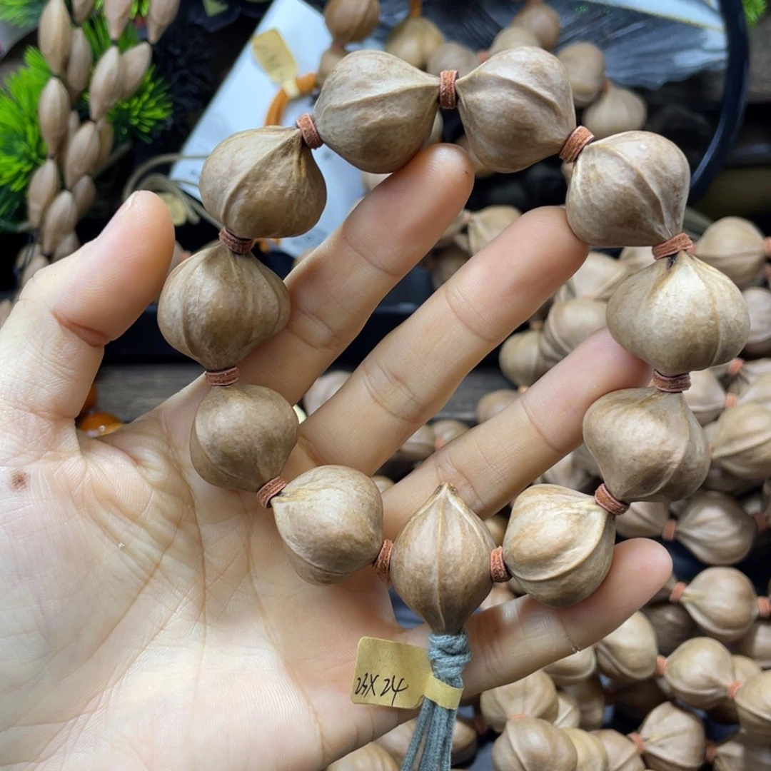 来****吊坠橄榄核2324铁核