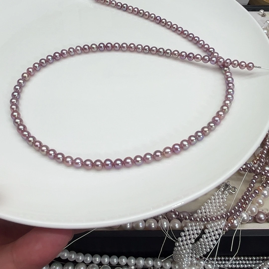 蘑****淡水珍珠手串银S925镶嵌4-4.5hm