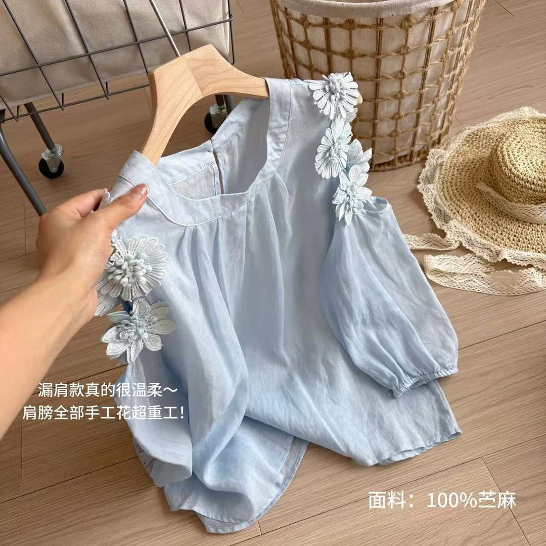 小柒家A00118-新款韩版显瘦超仙露肩款重工刺绣花朵洋气遮肉衬衫