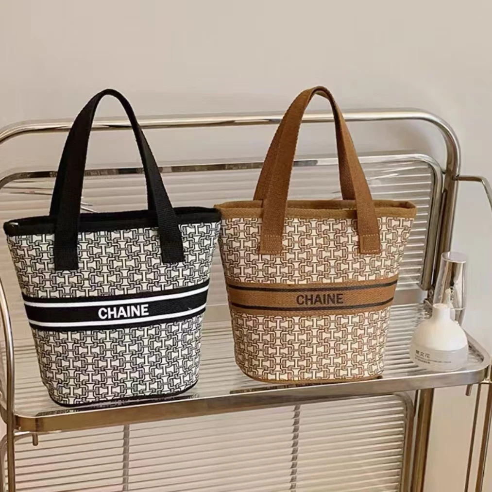 雾花新款韩版ins复古字母手提化妆洗漱包上班手拎通勤包零食包女