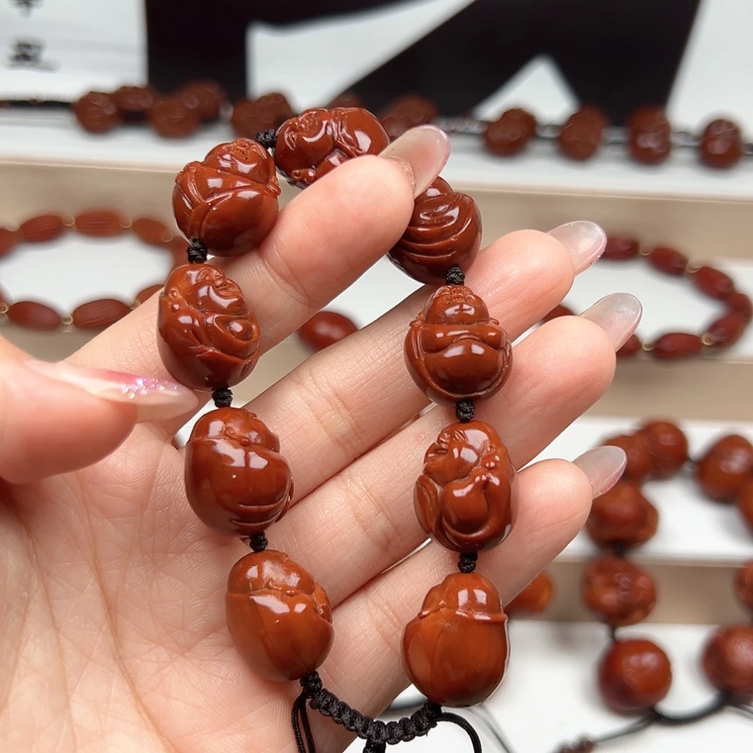 杠***杠橄榄核手串弥勒手串