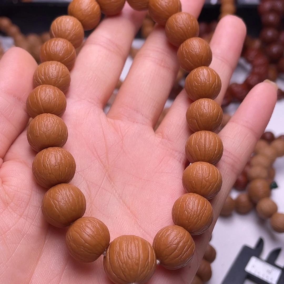 丁***学猴头核桃吊坠聚宝盆