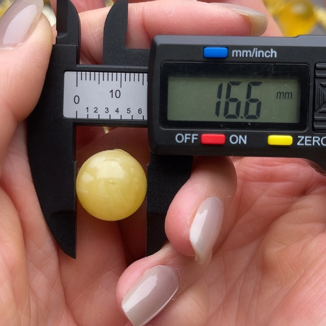 蜜蜡足铂镶嵌裸石蜜蜡微瑕圆珠鸽