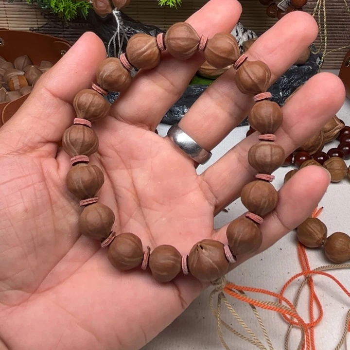 飞***@橄榄核吊坠橄榄核手串13*14