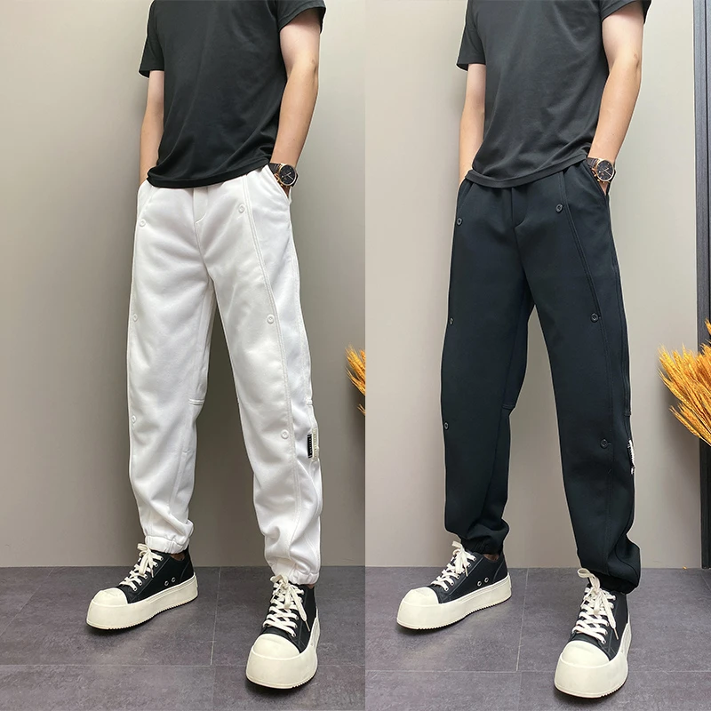 休闲裤2025秋季新款时尚排扣束脚哈伦裤男潮牌百搭纯色小脚运动裤
