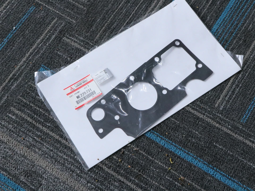 原厂ME225731节温器座垫片使用4M50发动机配件