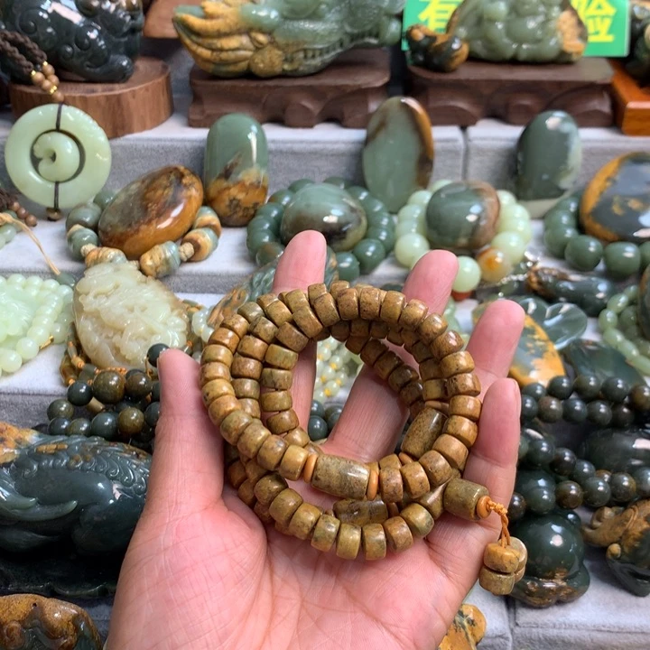 忍***桶岫岩河磨玉（透闪石质玉）未镶嵌把件