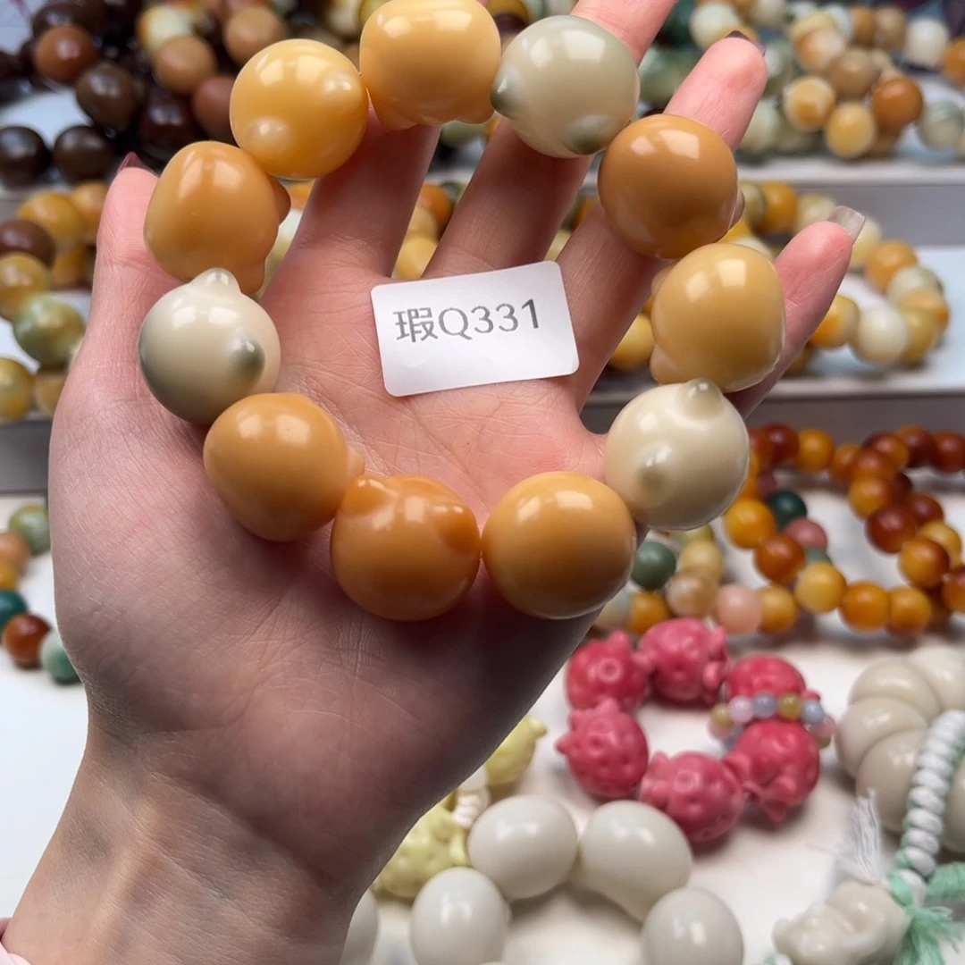 菩提根/象牙果手串晒****豆20mm瑕猫头一串q331