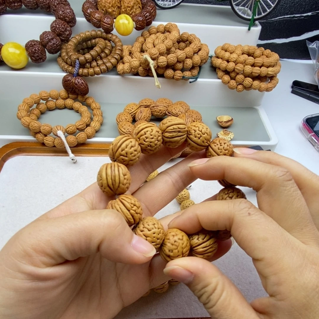 名***思桃核吊坠盘锦肌肉