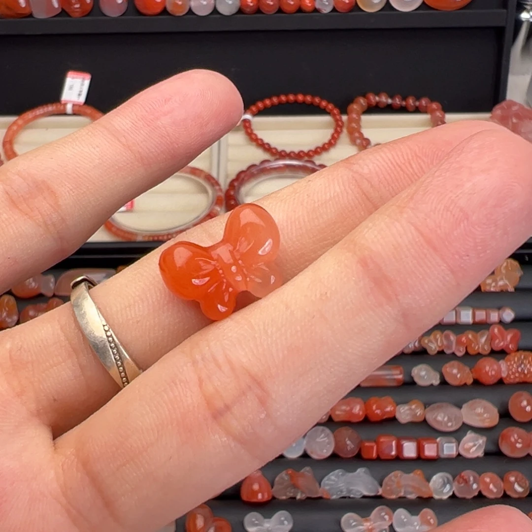 L***慧南红玛瑙未镶嵌川料蝴蝶结