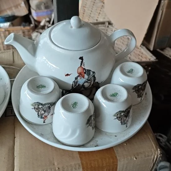 库存微瑕老寿星多孔茶壶一套