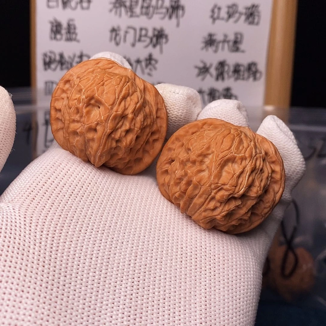 是***呀文玩核桃吊坠磨盘
