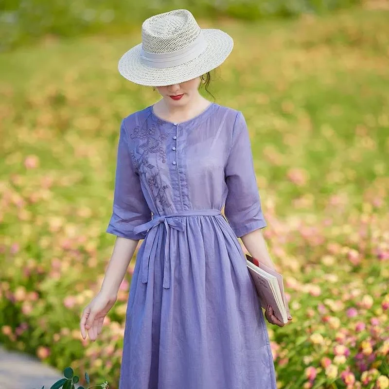 紫色棉麻连衣裙女夏季2025年新款高端苎麻女装民族风绣花大摆长裙