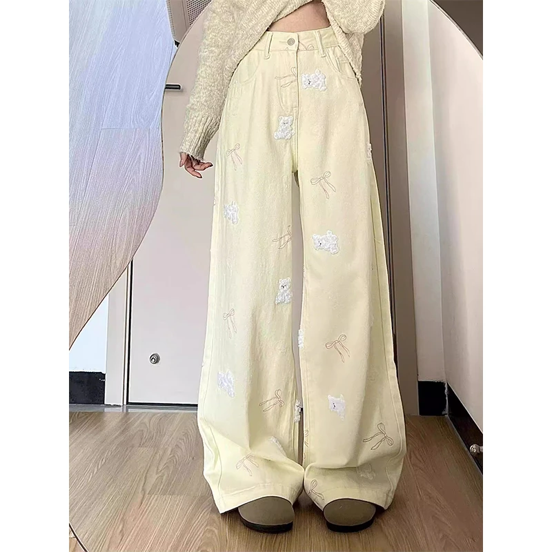 微胖mm春季少女奶黄色直筒牛仔裤女小熊蝴蝶结刺绣设计感阔腿裤子