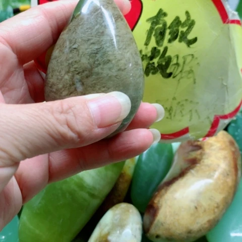 未镶嵌蛇纹石玉手把件