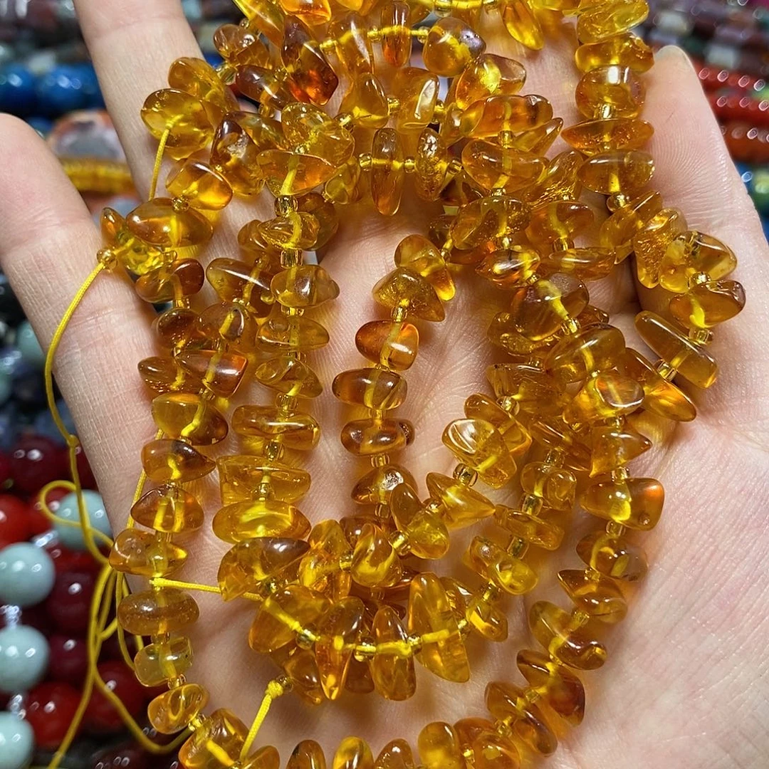玛瑙/玉髓未镶嵌珠宝半成品蜜蜡随形一条