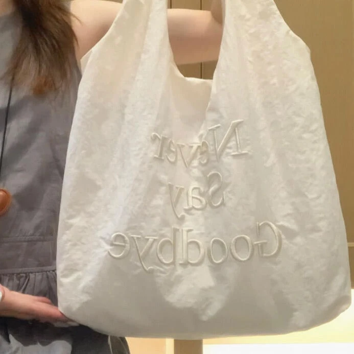 韩系尼龙帆布单肩托特包包女2025新款通勤刺绣包大容量背心腋下包