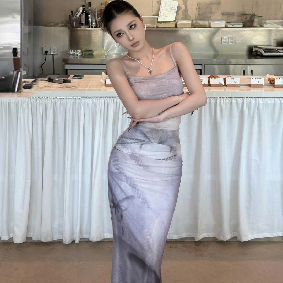 紫色蝴蝶印花吊带连衣裙女夏季性感修身显瘦包臀鱼尾裙碎花长裙